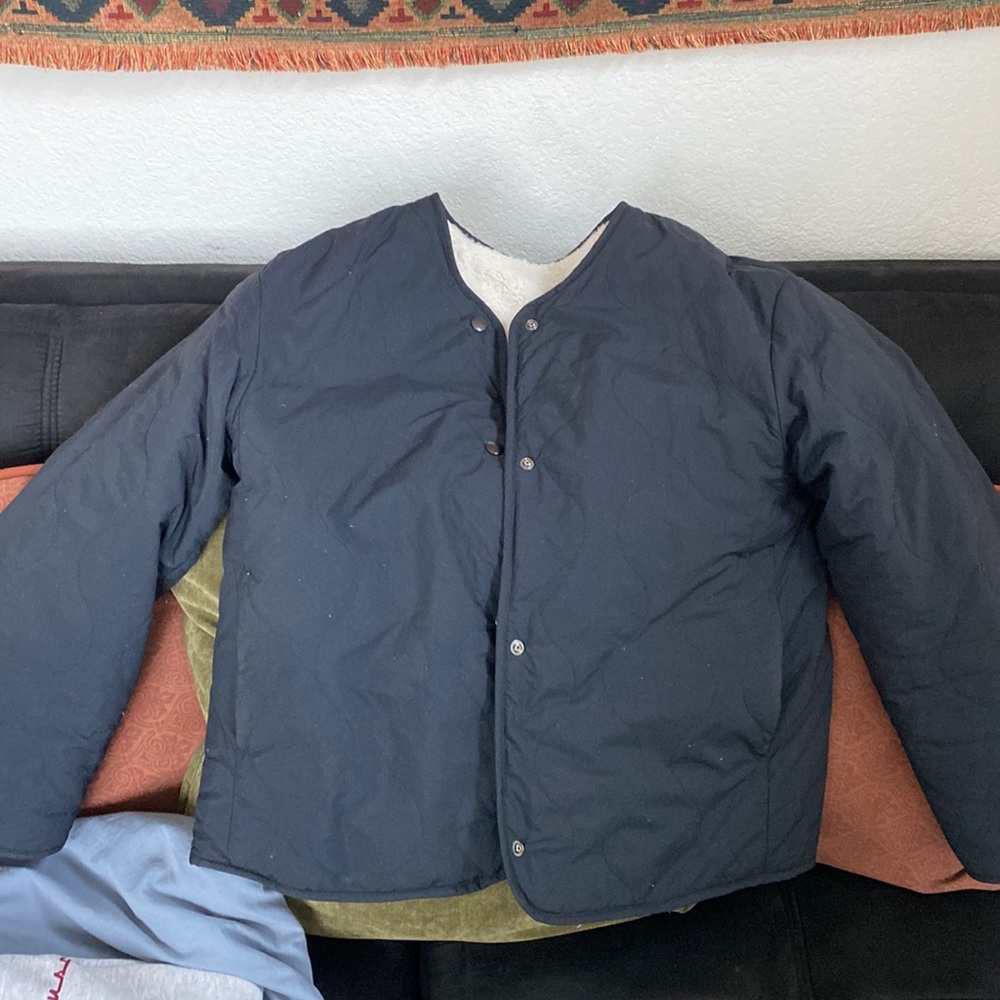 Quilted and reversible puffer jacket